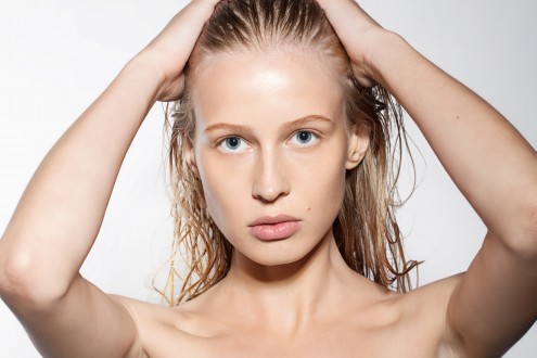 BM_Young woman with perfect skin removes clean _92803143