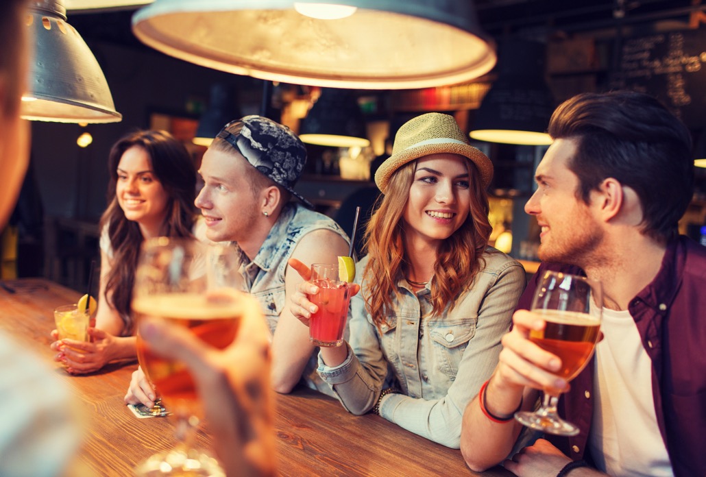bm_happy-friends-with-drinks-talking-at-bar-or-pub_106591525
