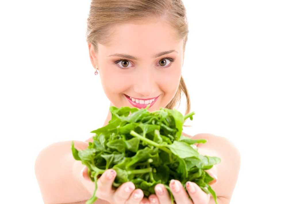 bm_happy-woman-with-spinach_18142076
