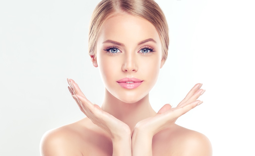 BM_Beautiful Young Woman with clean fresh skin . Facial treatment . Cosmetology , beauty and spa_127518347