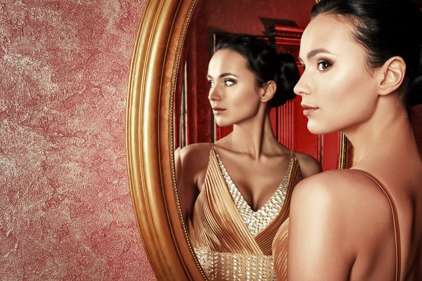 18599747 - beautiful young woman in a luxurious classic interior.